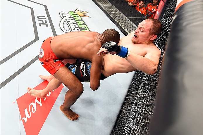 HOLLYWOOD, FL - JUNE 27: (L-R) Leandro Silva of Brazil takes down Lewis Gonzalez in their welterweight during the UFC Fight Night event at the Hard Rock Live on June 27, 2015 in Hollywood, Florida. (Photo by Josh Hedges/Zuffa LLC/Zuffa LLC via Getty Ima