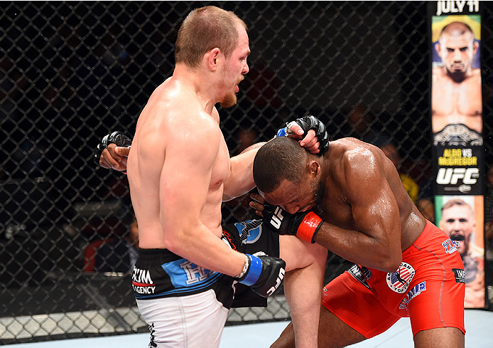 HOLLYWOOD, FL - JUNE 27: (L-R) Lewis Gonzalez lands a knee to the chin of Leandro Silva of Brazil in their welterweight during the UFC Fight Night event at the Hard Rock Live on June 27, 2015 in Hollywood, Florida. (Photo by Josh Hedges/Zuffa LLC/Zuffa L