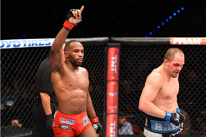 HOLLYWOOD, FL - JUNE 27: (L-R) Leandro Silva of Brazil celebrates after the final round against Lewis Gonzalez in their welterweight during the UFC Fight Night event at the Hard Rock Live on June 27, 2015 in Hollywood, Florida. (Photo by Josh Hedges/Zuf