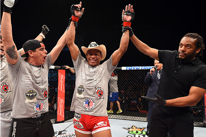 HOLLYWOOD, FL - JUNE 27: Alex Oliveira of Brazil celebrates after defeating Joe Merritt in their welterweight during the UFC Fight Night event at the Hard Rock Live on June 27, 2015 in Hollywood, Florida. (Photo by Josh Hedges/Zuffa LLC/Zuffa LLC via Get