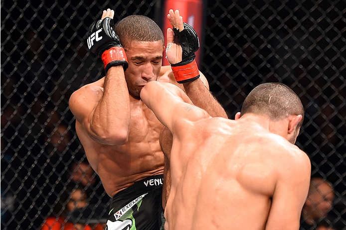 HOLLYWOOD, FL - JUNE 27: (R-L) Levan Makashvili punches Hacran Dias of Brazil in their featherweight during the UFC Fight Night event at the Hard Rock Live on June 27, 2015 in Hollywood, Florida. (Photo by Josh Hedges/Zuffa LLC/Zuffa LLC via Getty Image