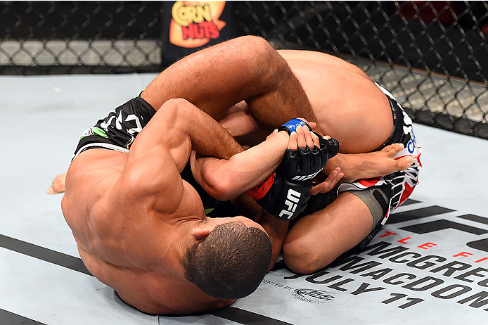HOLLYWOOD, FL - JUNE 27: (L-R) Hacran Dias of Brazil attempts a submission against Levan Makashvili in their featherweight during the UFC Fight Night event at the Hard Rock Live on June 27, 2015 in Hollywood, Florida. (Photo by Josh Hedges/Zuffa LLC/Zuff
