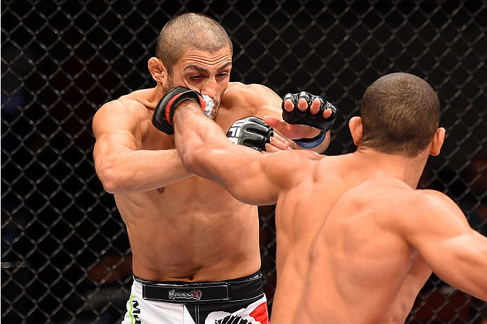 HOLLYWOOD, FL - JUNE 27: (R-L) Hacran Dias of Brazil punches Levan Makashvili in their featherweight during the UFC Fight Night event at the Hard Rock Live on June 27, 2015 in Hollywood, Florida. (Photo by Josh Hedges/Zuffa LLC/Zuffa LLC via Getty Image