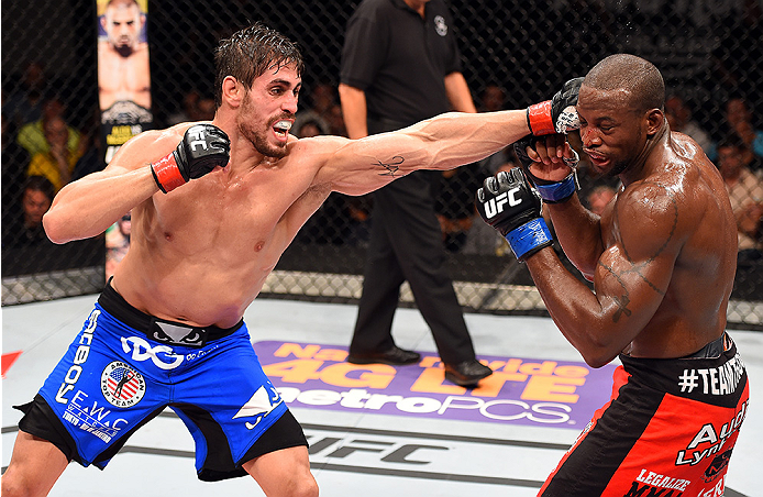 HOLLYWOOD, FL - JUNE 27: (L-R) Antonio Carlos Junior of Brazil punches Eddie Gordon in their middleweight during the UFC Fight Night event at the Hard Rock Live on June 27, 2015 in Hollywood, Florida. (Photo by Josh Hedges/Zuffa LLC/Zuffa LLC via Getty