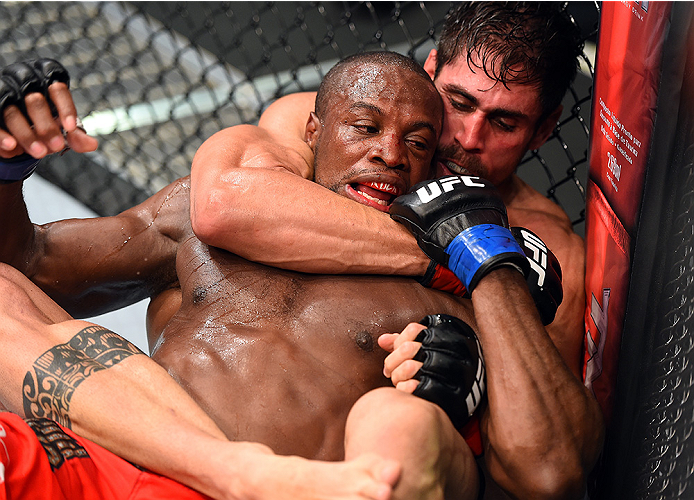 HOLLYWOOD, FL - JUNE 27: (R-L) Antonio Carlos Junior of Brazil attempts a submission against Eddie Gordon in their middleweight during the UFC Fight Night event at the Hard Rock Live on June 27, 2015 in Hollywood, Florida. (Photo by Josh Hedges/Zuffa LL