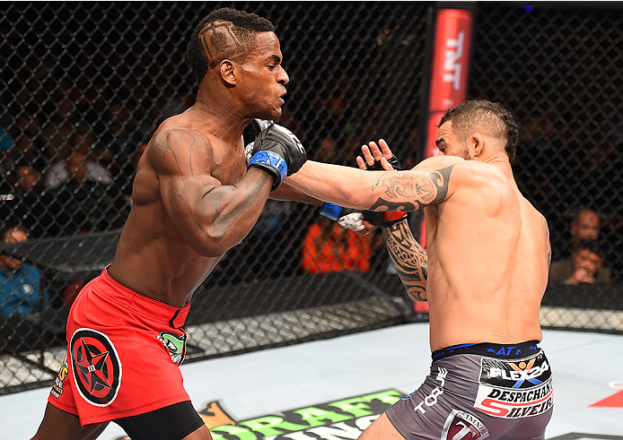 HOLLYWOOD, FL - JUNE 27: (L-R) Lorenz Larkin punches Santiago Ponzinibbio of Argentina in their welterweight during the UFC Fight Night event at the Hard Rock Live on June 27, 2015 in Hollywood, Florida. (Photo by Josh Hedges/Zuffa LLC/Zuffa LLC via Get