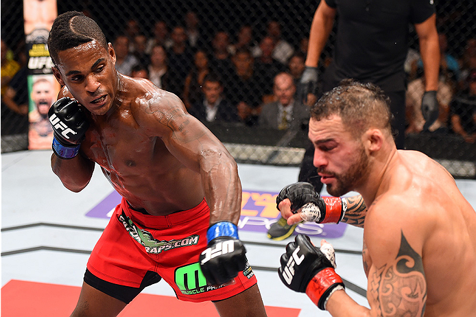 HOLLYWOOD, FL - JUNE 27: (L-R) Lorenz Larkin punches Santiago Ponzinibbio of Argentina in their welterweight during the UFC Fight Night event at the Hard Rock Live on June 27, 2015 in Hollywood, Florida. (Photo by Josh Hedges/Zuffa LLC/Zuffa LLC via Gett