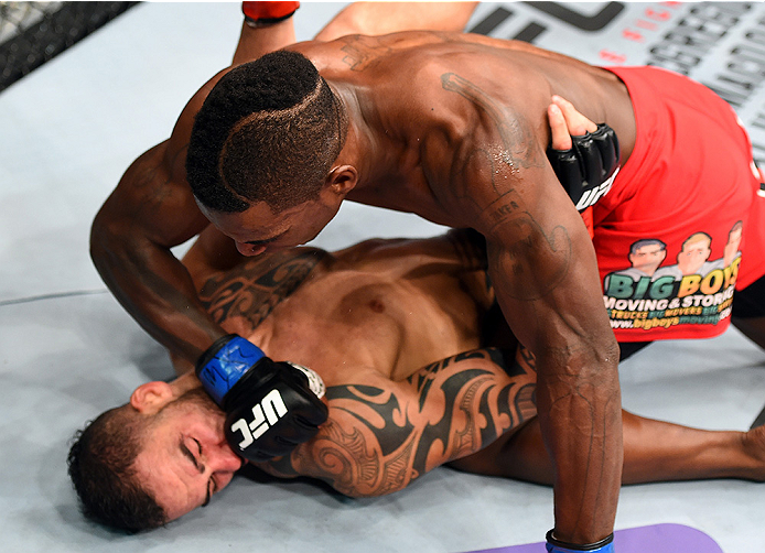 HOLLYWOOD, FL - JUNE 27: (R-L) Lorenz Larkin punches Santiago Ponzinibbio of Argentina in their welterweight during the UFC Fight Night event at the Hard Rock Live on June 27, 2015 in Hollywood, Florida. (Photo by Josh Hedges/Zuffa LLC/Zuffa LLC via Gett