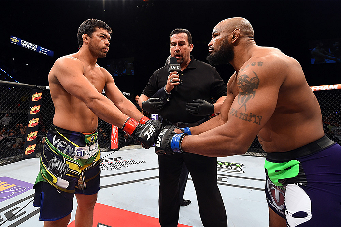 HOLLYWOOD, FL - JUNE 27: (L-R) Lyoto Machida of Brazil and Yoel Romero of Cuba touch gloves before their middleweight during the UFC Fight Night event at the Hard Rock Live on June 27, 2015 in Hollywood, Florida. (Photo by Josh Hedges/Zuffa LLC/Zuffa LL