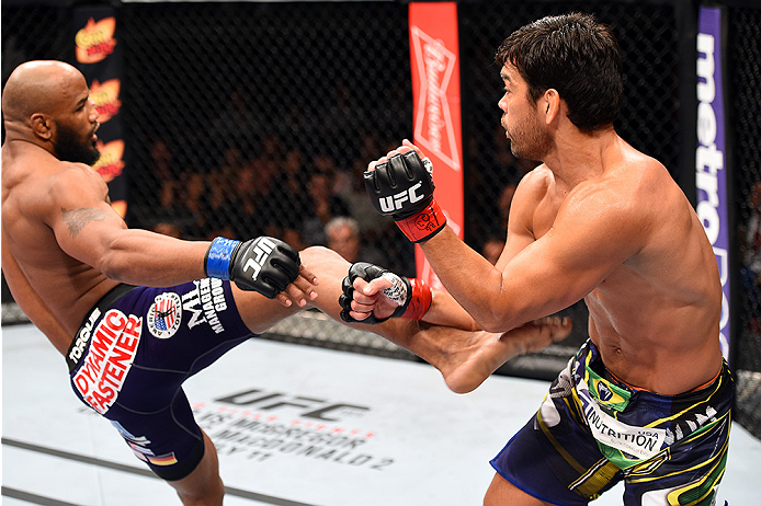 HOLLYWOOD, FL - JUNE 27: (L-R) Yoel Romero kicks Lyoto Machida in their middleweight during the UFC Fight Night event at the Hard Rock Live on June 27, 2015 in Hollywood, Florida. (Photo by Josh Hedges/Zuffa LLC/Zuffa LLC via Getty Images)