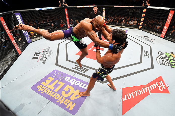 HOLLYWOOD, FL - JUNE 27: (L-R) Yoel Romero of Cuba lunges at Lyoto Machida of Brazil in their middleweight during the UFC Fight Night event at the Hard Rock Live on June 27, 2015 in Hollywood, Florida. (Photo by Josh Hedges/Zuffa LLC/Zuffa LLC via Getty