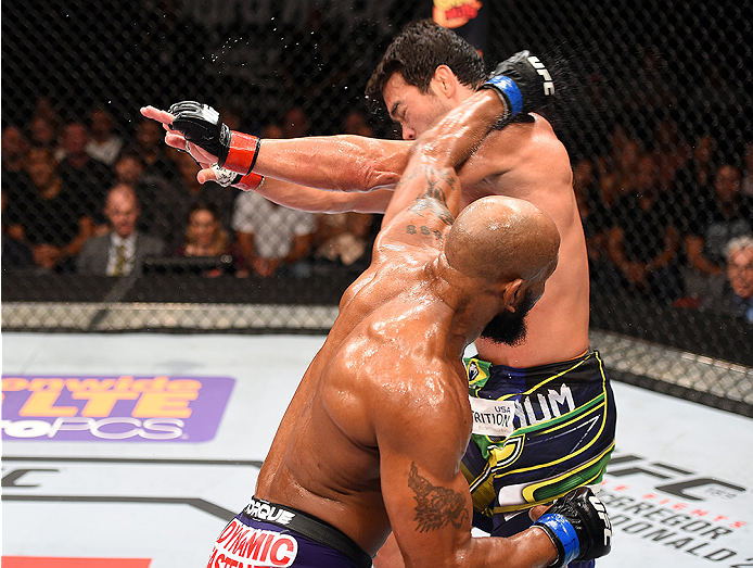 HOLLYWOOD, FL - JUNE 27: (L-R) Yoel Romero of Cuba punches Lyoto Machida of Brazil in their middleweight during the UFC Fight Night event at the Hard Rock Live on June 27, 2015 in Hollywood, Florida. (Photo by Josh Hedges/Zuffa LLC/Zuffa LLC via Getty Im