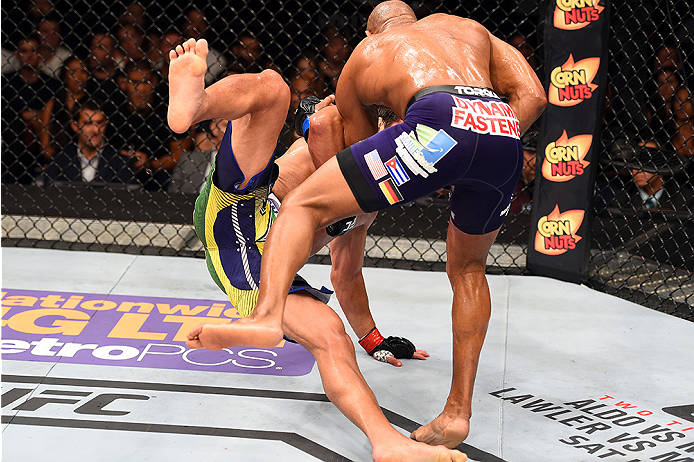HOLLYWOOD, FL - JUNE 27: (R-L) Yoel Romero of Cuba knocks down Lyoto Machida of Brazil in their middleweight during the UFC Fight Night event at the Hard Rock Live on June 27, 2015 in Hollywood, Florida. (Photo by Josh Hedges/Zuffa LLC/Zuffa LLC via Gett