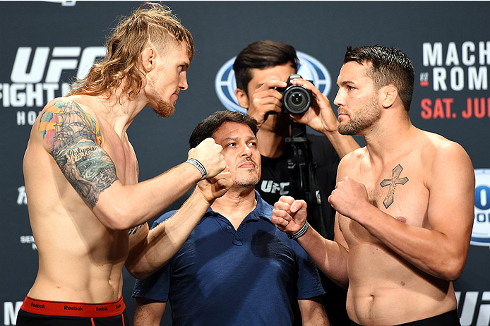 HOLLYWOOD, FL - JUNE 26: (L-R) Steve Montgomery and Tony Sims face off during the UFC weigh-in at the Seminole Hard Rock Casino on June 26, 2015 in Hollywood, Florida. (Photo by Josh Hedges/Zuffa LLC/Zuffa LLC via Getty Images)