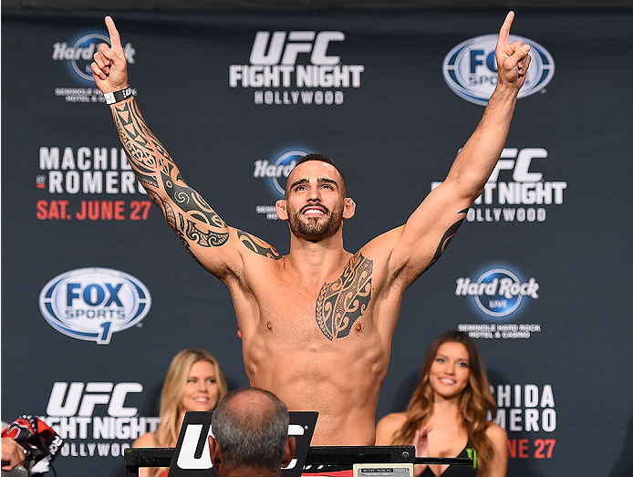 HOLLYWOOD, FL - JUNE 26: Santiago Ponzinibbio of Argentina steps on the scale during the UFC weigh-in at the Seminole Hard Rock Casino on June 26, 2015 in Hollywood, Florida. (Photo by Josh Hedges/Zuffa LLC/Zuffa LLC via Getty Images)