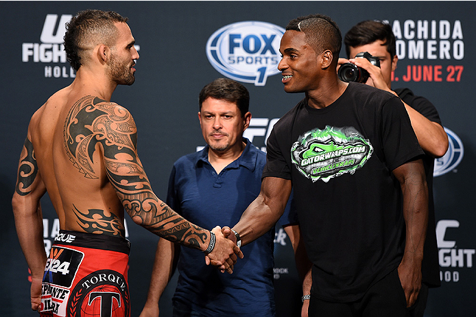 HOLLYWOOD, FL - JUNE 26: (L-R) Santiago Ponzinibbio of Argentina shakes hands with opponent Lorenz Larkin during the UFC weigh-in at the Seminole Hard Rock Casino on June 26, 2015 in Hollywood, Florida. (Photo by Josh Hedges/Zuffa LLC/Zuffa LLC via Gett