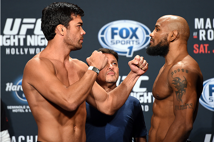 HOLLYWOOD, FL - JUNE 26: (L-R) Lyoto Machida of Brazil and Yoel Romero of Cuba face-off during the UFC weigh-in at the Seminole Hard Rock Casino on June 26, 2015 in Hollywood, Florida. (Photo by Josh Hedges/Zuffa LLC/Zuffa LLC via Getty Images)