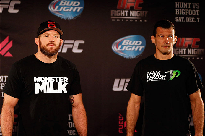 BRISBANE, AUSTRALIA - DECEMBER 05: (L-R) Opponents Ryan Bader and Anthony Perosh pose for photos during the UFC Ultimate Media Day at the Brisbane Marriott Hotel on December 5, 2013 in Brisbane, Australia. (Photo by Josh Hedges/Zuffa LLC/Zuffa LLC via Ge
