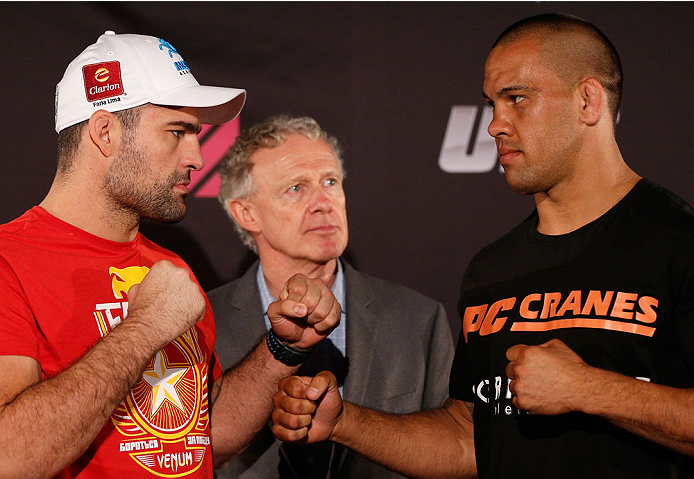 BRISBANE, AUSTRALIA - DECEMBER 05: (L-R) Opponents Mauricio "Shogun" Rua and James Te Huna face off during the UFC Ultimate Media Day at the Brisbane Marriott Hotel on December 5, 2013 in Brisbane, Australia. (Photo by Josh Hedges/Zuffa LLC/Zuffa LLC via