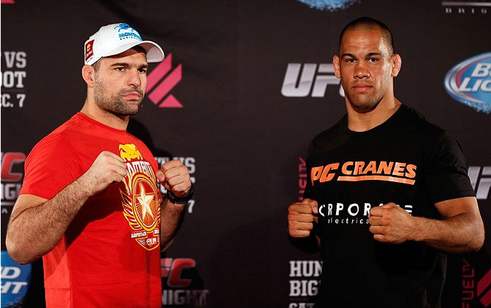 BRISBANE, AUSTRALIA - DECEMBER 05: (L-R) Opponents Mauricio "Shogun" Rua and James Te Huna pose for photos during the UFC Ultimate Media Day at the Brisbane Marriott Hotel on December 5, 2013 in Brisbane, Australia. (Photo by Josh Hedges/Zuffa LLC/Zuffa