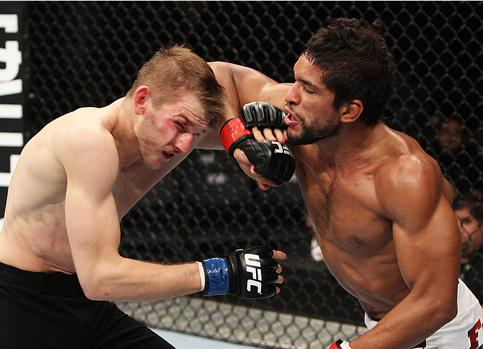 SAITAMA, JAPAN - SEPTEMBER 20: Maximo Blanco lands an elbow on Daniel Hooker in their featherweight bout during the UFC Fight Night event inside the Saitama Arena on September 20, 2014 in Saitama, Japan. (Photo by Mitch Viquez/Zuffa LLC/Zuffa LLC via Gett