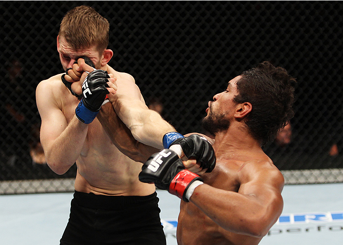 SAITAMA, JAPAN - SEPTEMBER 20:Maximo Blanco lands a punch on Daniel Hooker in their featherweight bout during the UFC Fight Night event inside the Saitama Arena on September 20, 2014 in Saitama, Japan. (Photo by Mitch Viquez/Zuffa LLC/Zuffa LLC via Getty