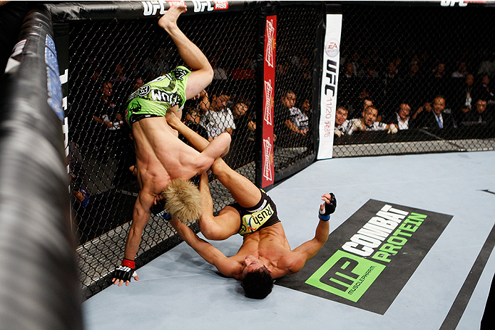 SAITAMA, JAPAN - SEPTEMBER 20: Kyung Ho Kang looks to flip Michinori Tanaka in their bantamweight bout during the UFC Fight Night event inside the Saitama Arena on September 20, 2014 in Saitama, Japan. (Photo by Mitch Viquez/Zuffa LLC/Zuffa LLC via Gett