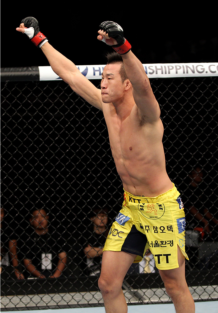 SAITAMA, JAPAN - SEPTEMBER 20: Hyun Gyu Lim celebrates after his win over Takenori Sato in their welterweight bout during the UFC Fight Night event inside the Saitama Arena on September 20, 2014 in Saitama, Japan. (Photo by Mitch Viquez/Zuffa LLC/Zuffa