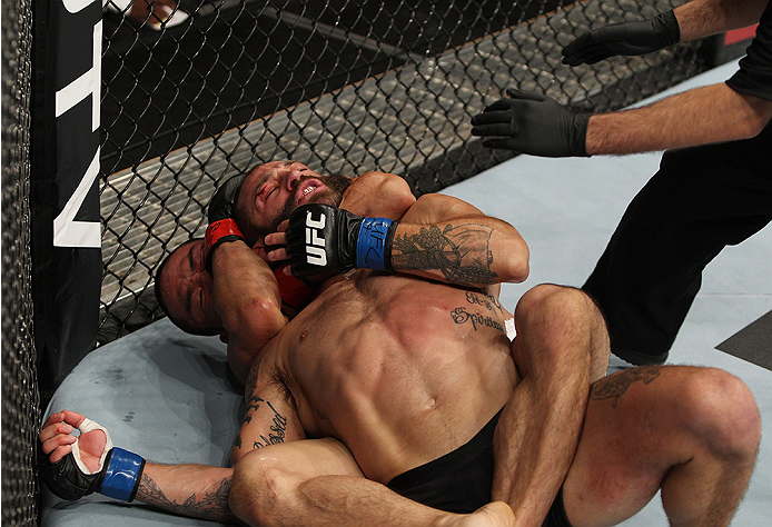 SAITAMA, JAPAN - SEPTEMBER 20: Katsunori Kikuno submits Sam Sicilia for the victory in their featherweight bout during the UFC Fight Night event inside the Saitama Arena on September 20, 2014 in Saitama, Japan. (Photo by Mitch Viquez/Zuffa LLC/Zuffa LLC