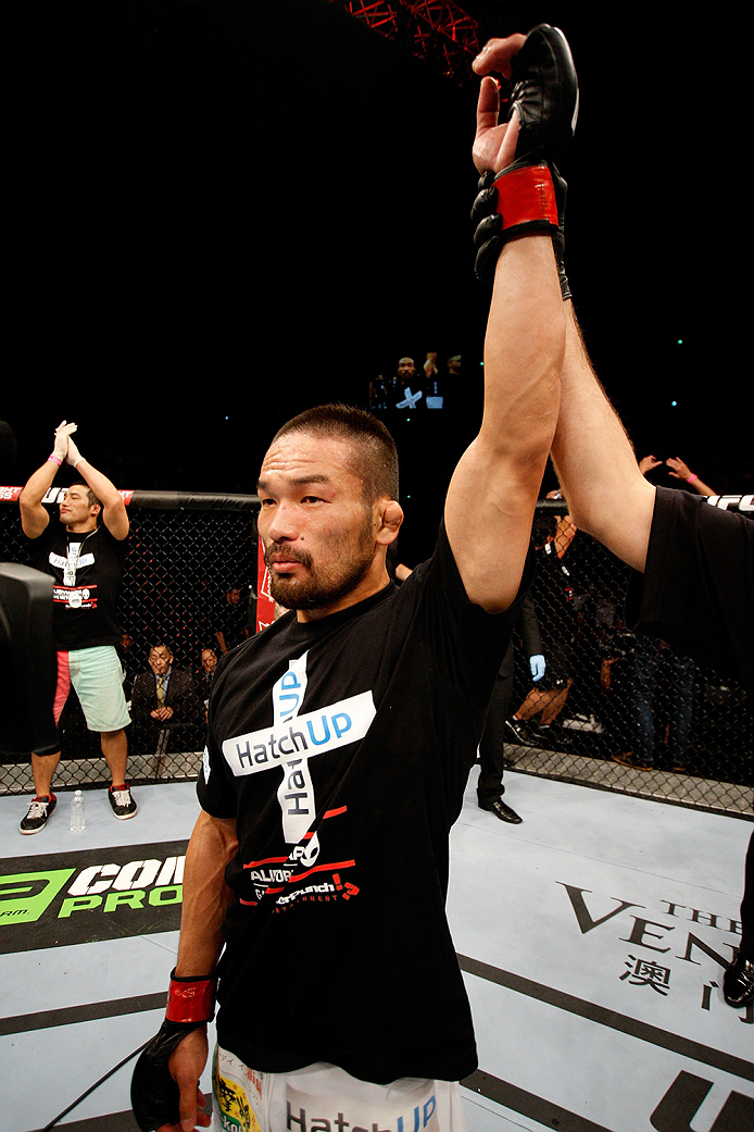 SAITAMA, JAPAN - SEPTEMBER 20: Katsunori Kikuno celebrates his win over Sam Sicilia in their featherweight bout during the UFC Fight Night event inside the Saitama Arena on September 20, 2014 in Saitama, Japan. (Photo by Mitch Viquez/Zuffa LLC/Zuffa LLC