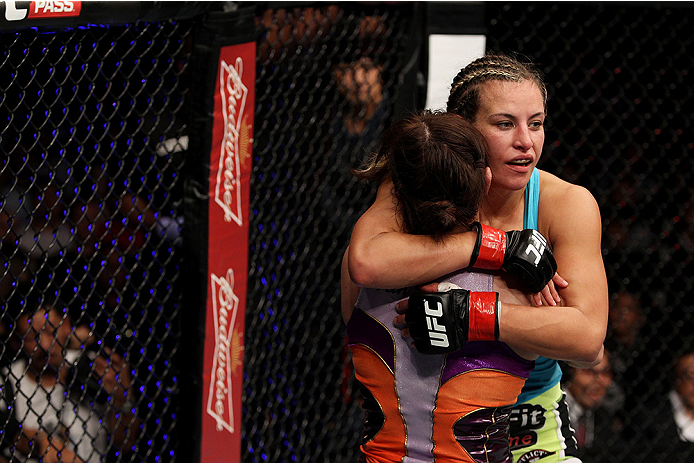 SAITAMA, JAPAN - SEPTEMBER 20: Miesha Tate(facing) and Rin Nakai hug after their bantamweight bout during the UFC Fight Night event inside the Saitama Arena on September 20, 2014 in Saitama, Japan. (Photo by Mitch Viquez/Zuffa LLC/Zuffa LLC via Getty Imag