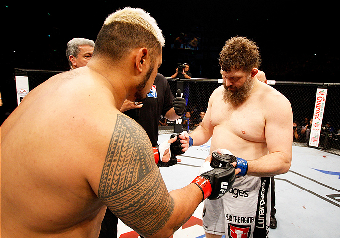 SAITAMA, JAPAN - SEPTEMBER 20: (L to R) Mark Hunt and Roy Nelson touch gloves before their heavyweight bout during the UFC Fight Night event inside the Saitama Arena on September 20, 2014 in Saitama, Japan. (Photo by Mitch Viquez/Zuffa LLC/Zuffa LLC via G