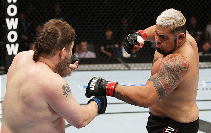 SAITAMA, JAPAN - SEPTEMBER 20: Mark Hunt loads up to throw a punch on Roy Nelson in their heavyweight bout during the UFC Fight Night event inside the Saitama Arena on September 20, 2014 in Saitama, Japan. (Photo by Mitch Viquez/Zuffa LLC/Zuffa LLC via G