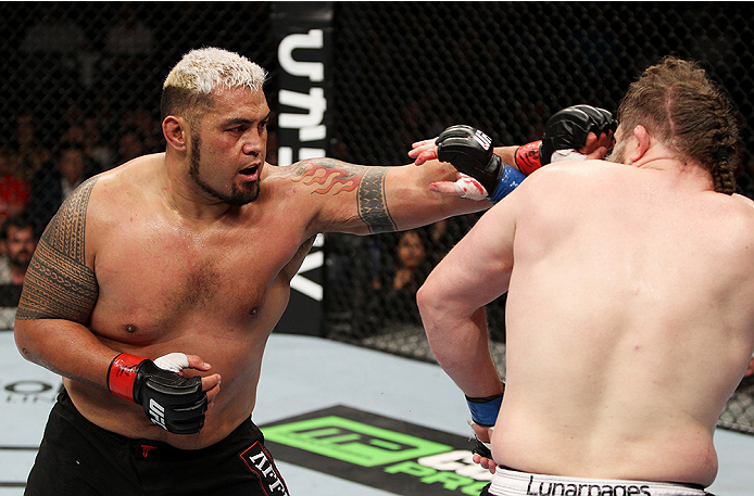 SAITAMA, JAPAN - SEPTEMBER 20: Mark Hunt throws a punchat Roy Nelson in their heavyweight bout during the UFC Fight Night event inside the Saitama Arena on September 20, 2014 in Saitama, Japan. (Photo by Mitch Viquez/Zuffa LLC/Zuffa LLC via Getty Images)