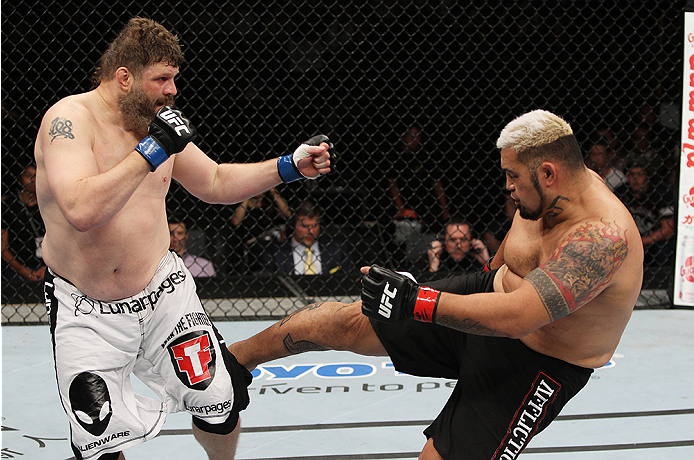 SAITAMA, JAPAN - SEPTEMBER 20: Mark Hunt kicks Roy Nelson in their heavyweight bout during the UFC Fight Night event inside the Saitama Arena on September 20, 2014 in Saitama, Japan. (Photo by Mitch Viquez/Zuffa LLC/Zuffa LLC via Getty Images)