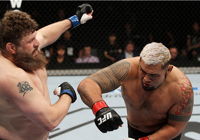 SAITAMA, JAPAN - SEPTEMBER 20: Mark Hunt throws a punch at Roy Nelson in their heavyweight bout during the UFC Fight Night event inside the Saitama Arena on September 20, 2014 in Saitama, Japan. (Photo by Mitch Viquez/Zuffa LLC/Zuffa LLC via Getty Images