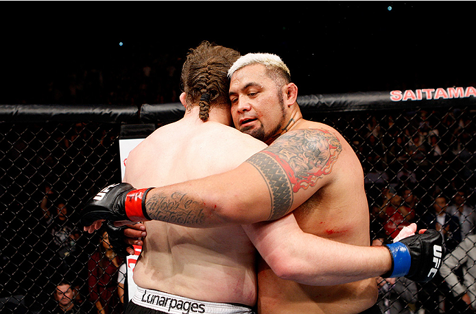 SAITAMA, JAPAN - SEPTEMBER 20: (L to R) Roy Nelson and Mark Hunt embrace after their heavyweight bout during the UFC Fight Night event inside the Saitama Arena on September 20, 2014 in Saitama, Japan. (Photo by Mitch Viquez/Zuffa LLC/Zuffa LLC via Getty