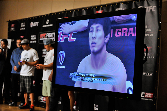 TOKYO, JAPAN - SEPTEMBER 17: New EA UFC video game character of Takeya Mizugaki is seen on screen during the UFC Ultimate Media Day at the Hilton Tokyo on September 17, 2014 in Tokyo, Japan. (Photo by Keith Tsuji/Zuffa LLC/Zuffa LLC via Getty Images)