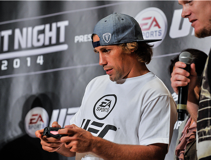 TOKYO, JAPAN - SEPTEMBER 17: Urijah Faber plays the new EA UFC video game during the UFC Ultimate Media Day at the Hilton Tokyo on September 17, 2014 in Tokyo, Japan. (Photo by Keith Tsuji/Zuffa LLC/Zuffa LLC via Getty Images)