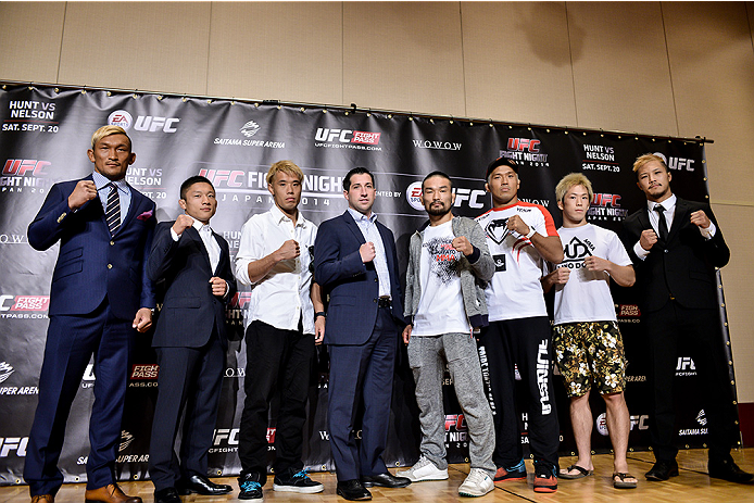 TOKYO, JAPAN - SEPTEMBER 17: (L-R) Kiichi Kunimoto, Kyoji Horiguchi, Masanori Kanehara, Joe Carr, Katsunori Kikuno, Takenori Sato, Michinori Tanaka and Kazuki Tokudome pose for media during the UFC Ultimate Media Day at the Hilton Tokyo on September 17,
