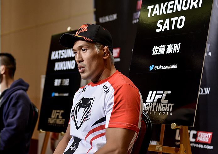 TOKYO, JAPAN - SEPTEMBER 17: Takenori Sato interacts with media during the UFC Ultimate Media Day at the Hilton Tokyo on September 17, 2014 in Tokyo, Japan. (Photo by Keith Tsuji/Zuffa LLC/Zuffa LLC via Getty Images)