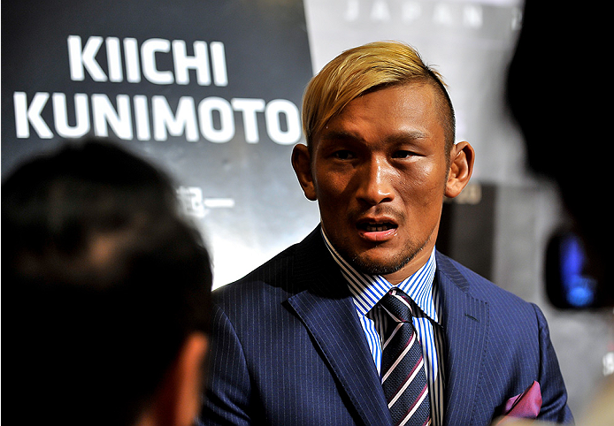 TOKYO, JAPAN - SEPTEMBER 17: Kiichi Kunimoto interacts with media during the UFC Ultimate Media Day at the Hilton Tokyo on September 17, 2014 in Tokyo, Japan. (Photo by Keith Tsuji/Zuffa LLC/Zuffa LLC via Getty Images)