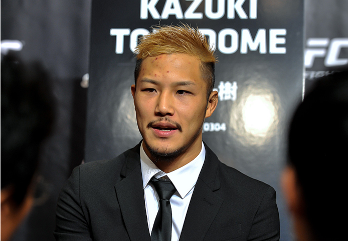 TOKYO, JAPAN - SEPTEMBER 17: Kazuki Tokudome interacts with media during the UFC Ultimate Media Day at the Hilton Tokyo on September 17, 2014 in Tokyo, Japan. (Photo by Keith Tsuji/Zuffa LLC/Zuffa LLC via Getty Images)
