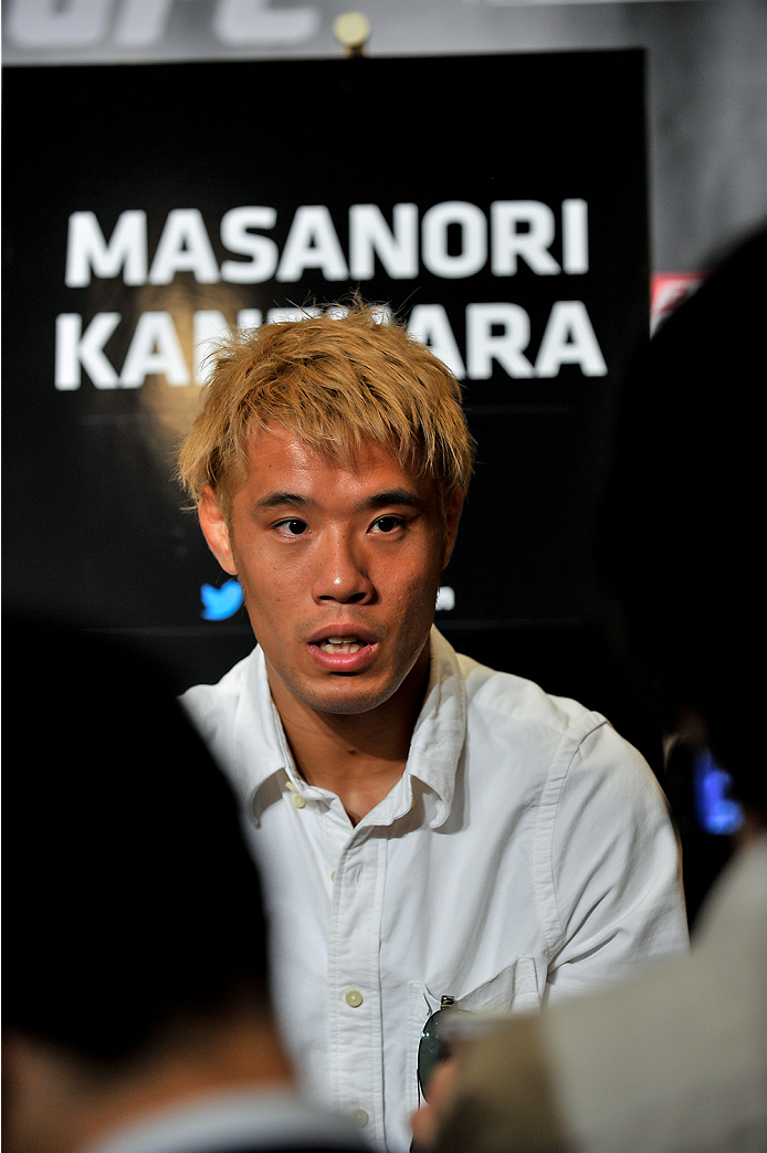 TOKYO, JAPAN - SEPTEMBER 17: Masanori Kanehara interacts with media during the UFC Ultimate Media Day at the Hilton Tokyo on September 17, 2014 in Tokyo, Japan. (Photo by Keith Tsuji/Zuffa LLC/Zuffa LLC via Getty Images)