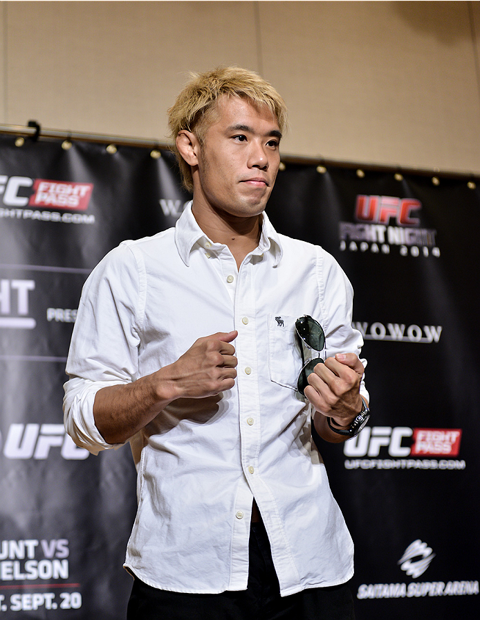 TOKYO, JAPAN - SEPTEMBER 17: Masanori Kanehara interacts with media during the UFC Ultimate Media Day at the Hilton Tokyo on September 17, 2014 in Tokyo, Japan. (Photo by Keith Tsuji/Zuffa LLC/Zuffa LLC via Getty Images)