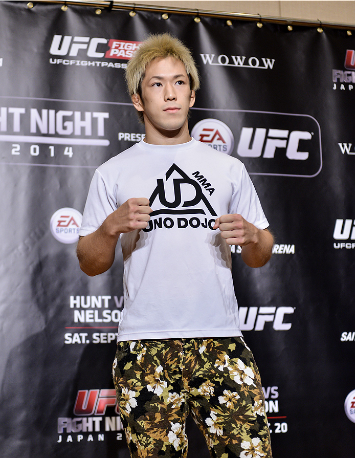 TOKYO, JAPAN - SEPTEMBER 17: Michinori Tanaka interacts with media during the UFC Ultimate Media Day at the Hilton Tokyo on September 17, 2014 in Tokyo, Japan. (Photo by Keith Tsuji/Zuffa LLC/Zuffa LLC via Getty Images)