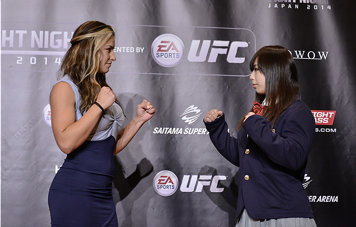TOKYO, JAPAN - SEPTEMBER 17: Miesha Tate (L) and Rin Nakai square off for the media during the UFC Ultimate Media Day at the Hilton Tokyo on September 17, 2014 in Tokyo, Japan. (Photo by Keith Tsuji/Zuffa LLC/Zuffa LLC via Getty Images)