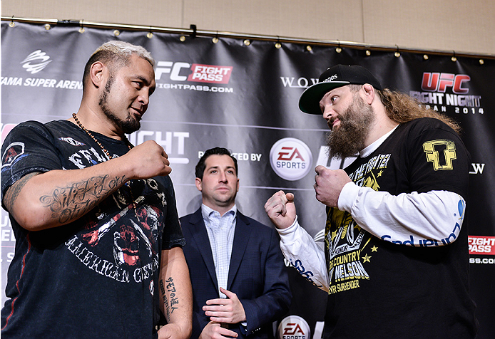 TOKYO, JAPAN - SEPTEMBER 17: Mark Hunt (L) and Roy Nelson square off for the media during the UFC Ultimate Media Day at the Hilton Tokyo on September 17, 2014 in Tokyo, Japan. (Photo by Keith Tsuji/Zuffa LLC/Zuffa LLC via Getty Images)