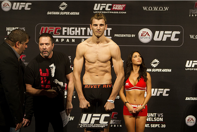 SAITAMA, JAPAN - SEPTEMBER 19: Dan Hooker steps on the scale during the UFC Fight Night weigh-in event on September 19, 2014 in Saitama, Japan. (Photo by Mitch Viquez/Zuffa LLC/Zuffa LLC via Getty Images)