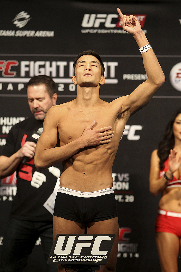 SAITAMA, JAPAN - SEPTEMBER 19: Kyung Ho Kang steps on the scale during the UFC Fight Night weigh-in event on September 19, 2014 in Saitama, Japan. (Photo by Mitch Viquez/Zuffa LLC/Zuffa LLC via Getty Images)